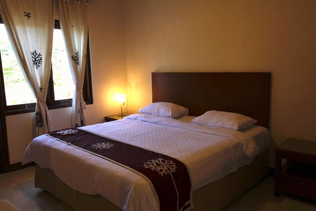 Niramaya Villa Seminyak Quarto foto